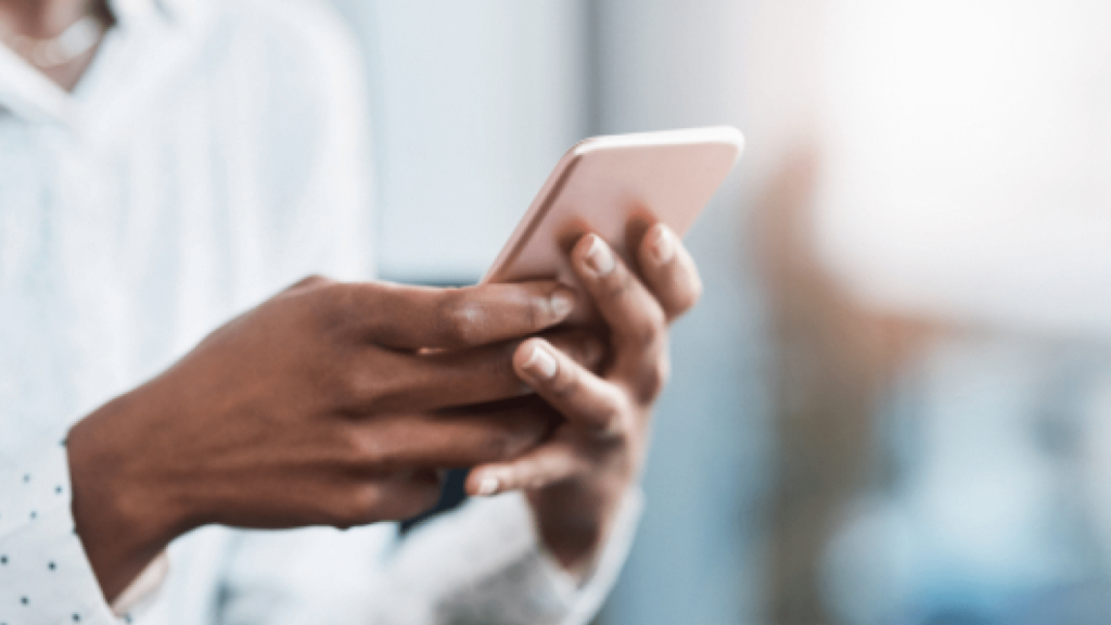 Smart phone being used by a woman