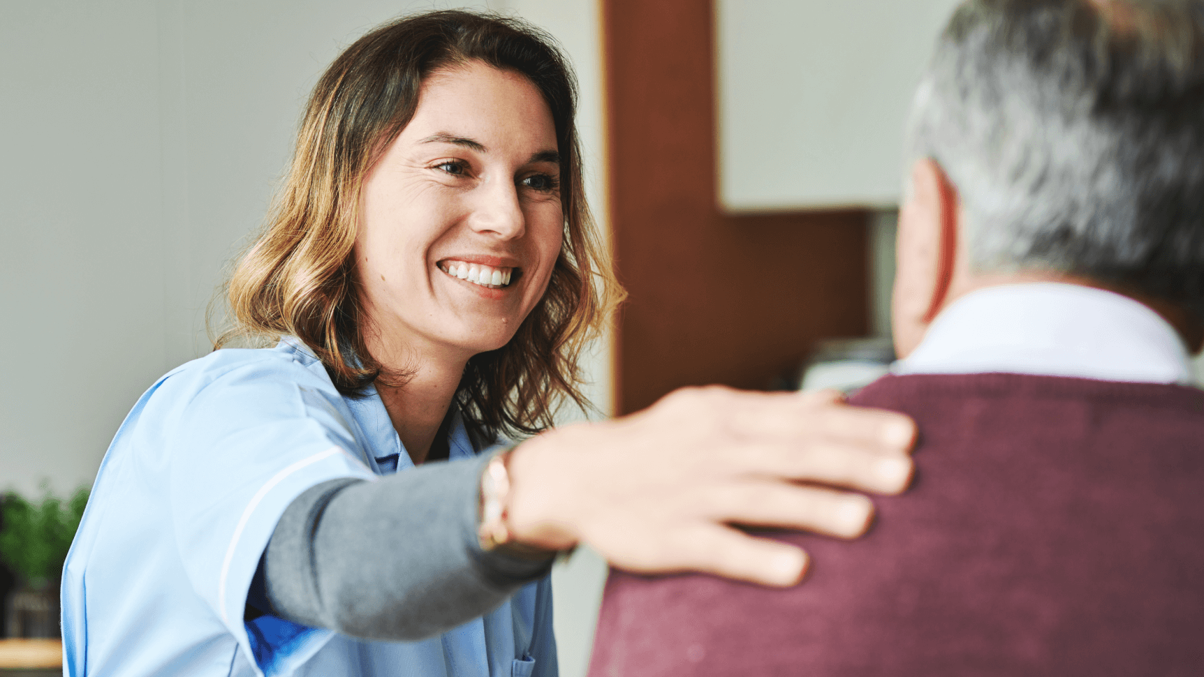 NHS worker caring for older person