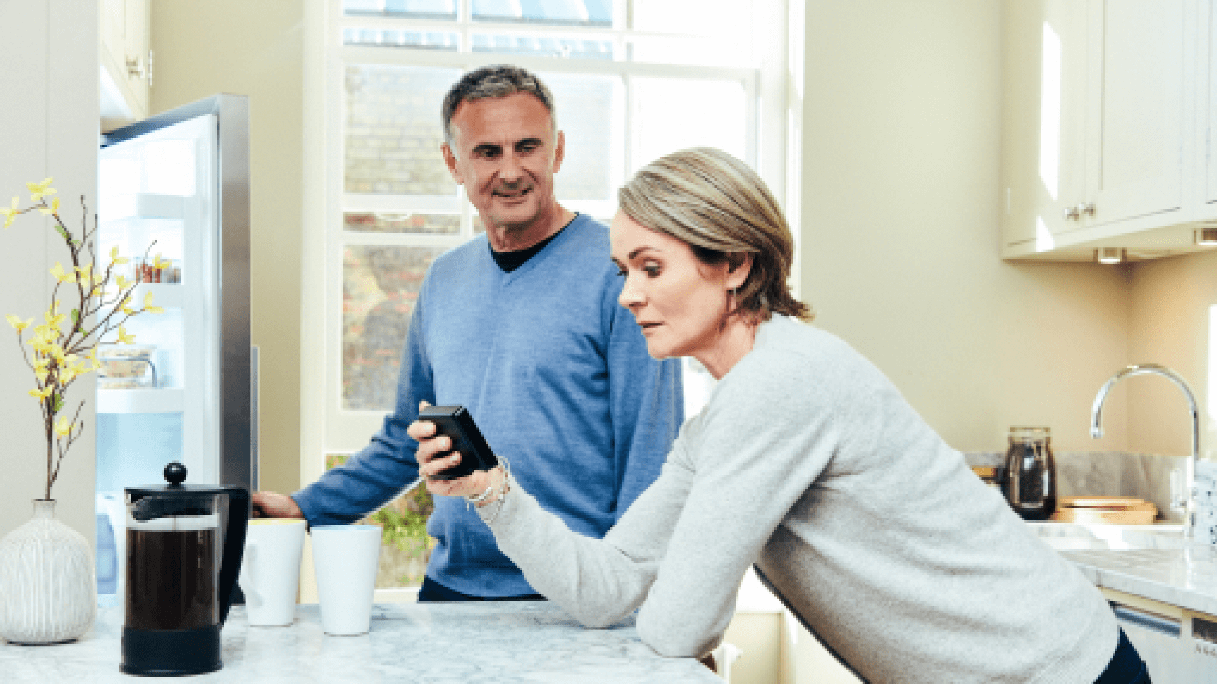 couple enjoying benefits of smart meter